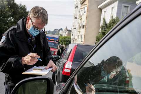San Francisco Paints No-Parking Zone Around Parked Car, Tickets it