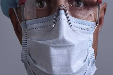 When should personal protective equipment be changed?