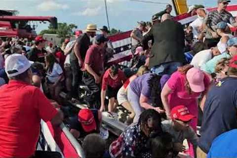 Bloodied Person Carried Away From Stands Following Shooting at Trump Rally